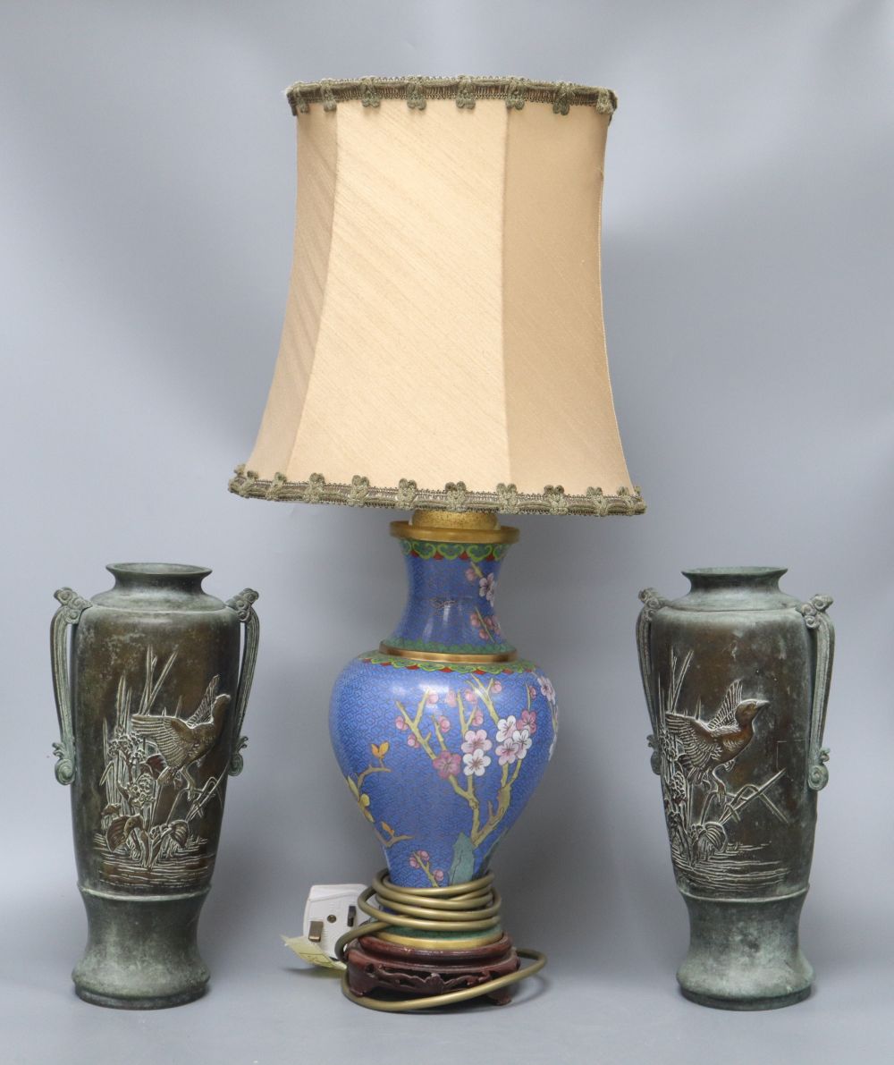 A pair of Chinese bronze iris decorated vases, height 28cm and a cloisonne lamp